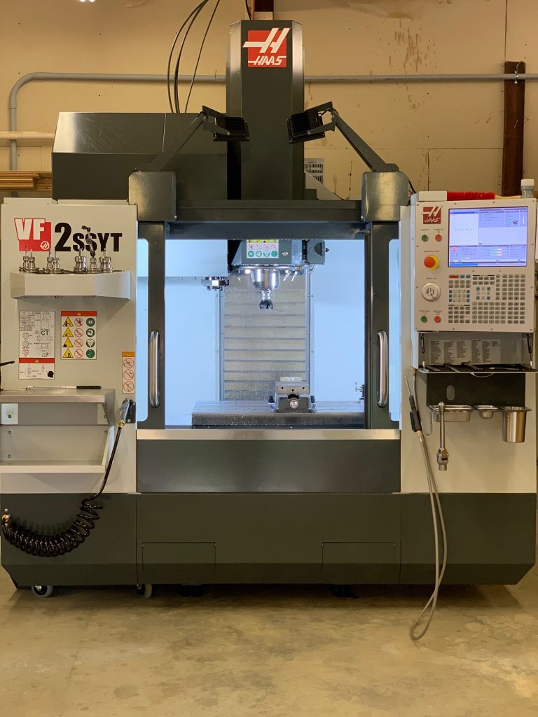 the main machine in our machine shop a Haas VF2SSYT vertical cnc mill
